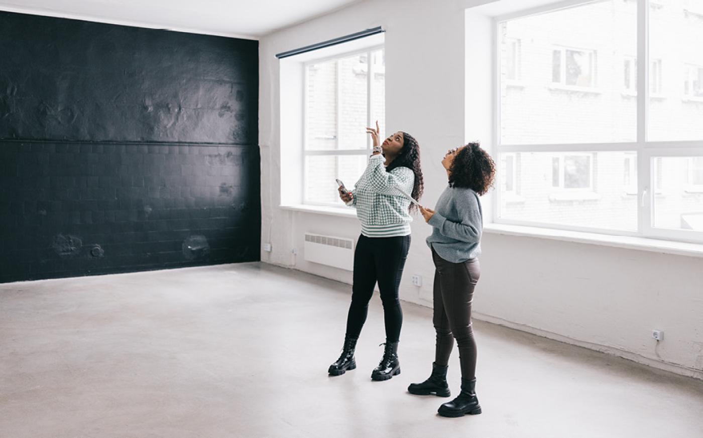 women in a room looking up